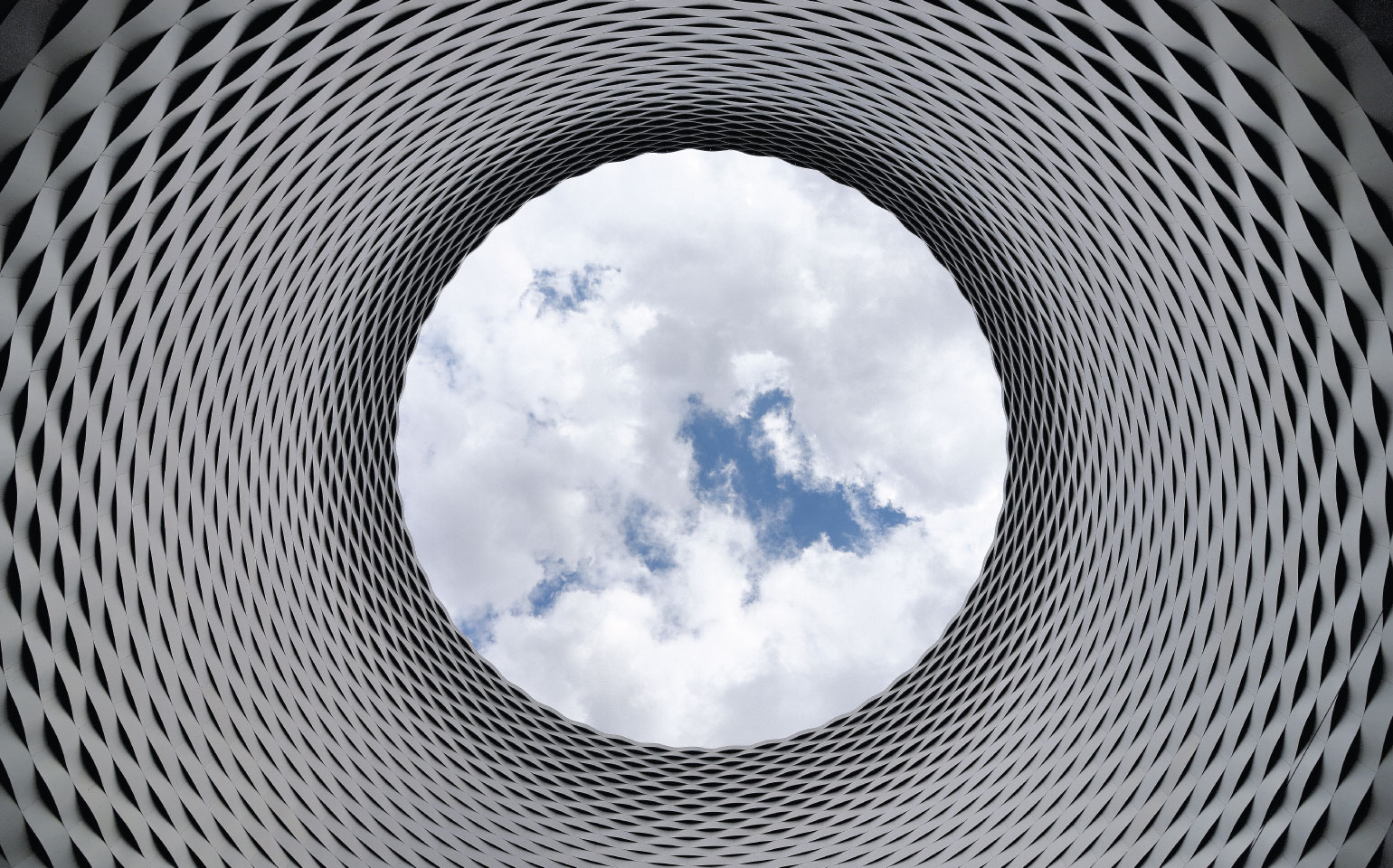 view of clouds through tunnel
