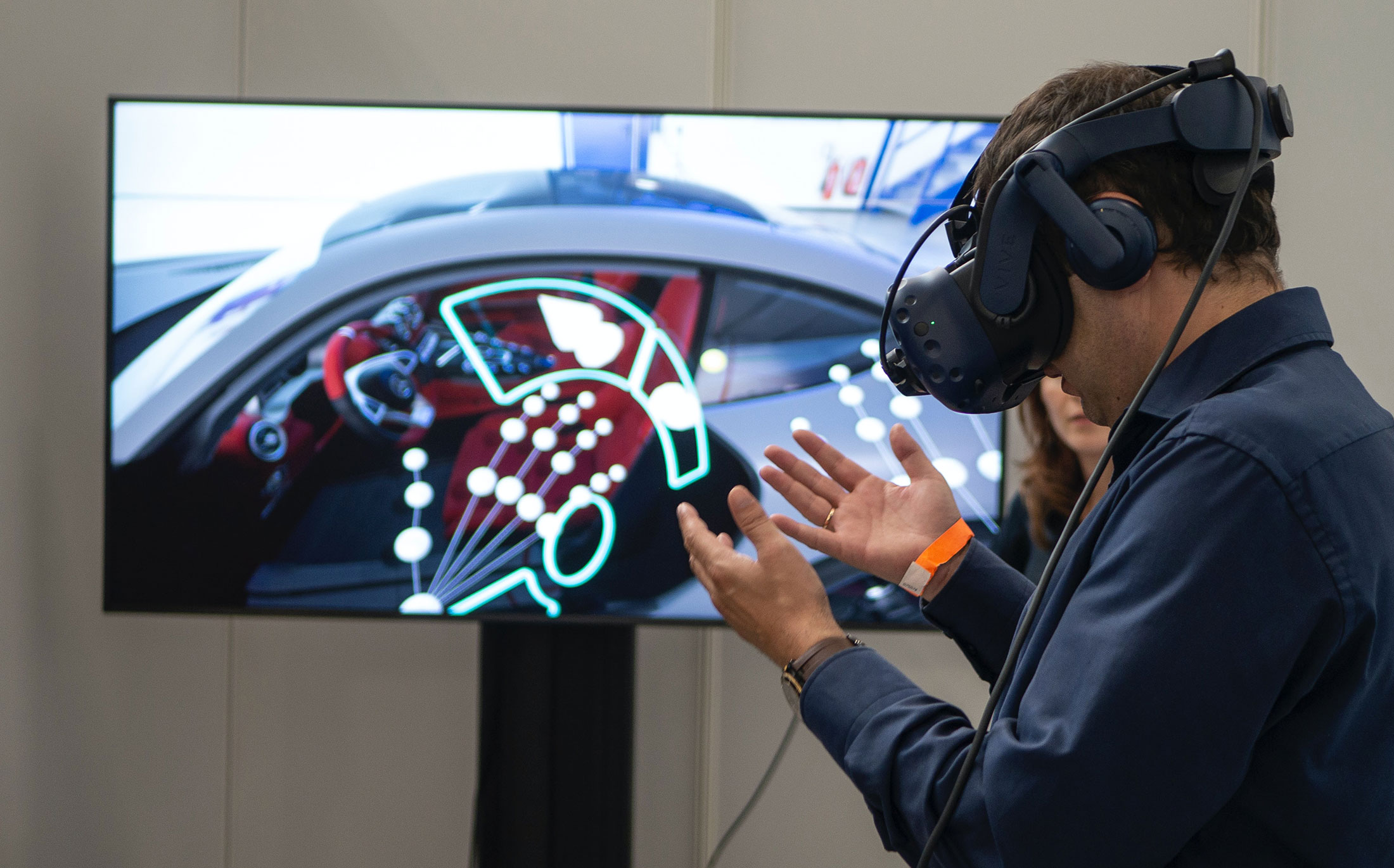 A man using VR Goggles to view a virtual reality environment