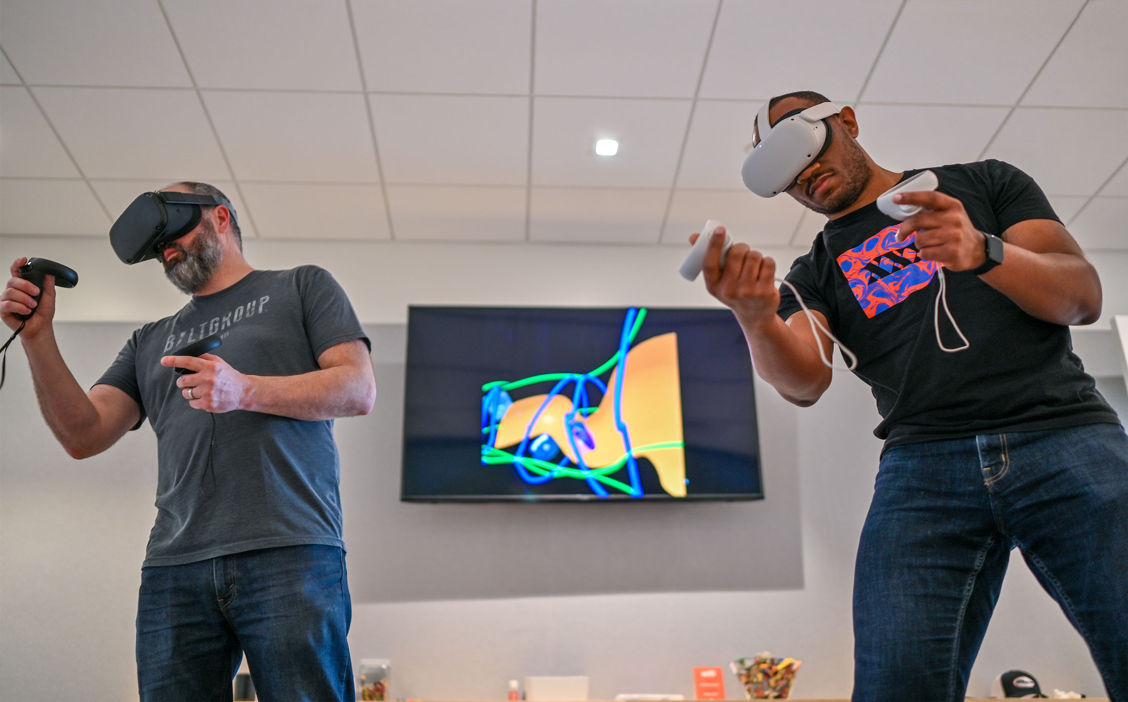 Two men interacting inside a virtual reality environment