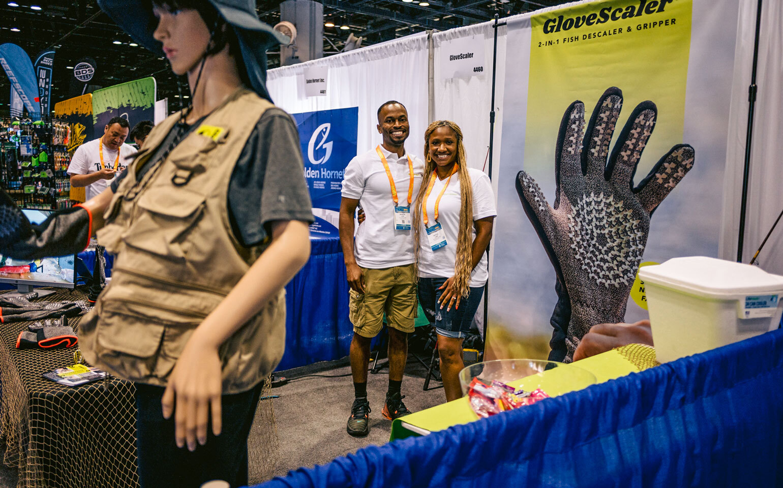 Glovescaler owners in booth at ICAST 2024