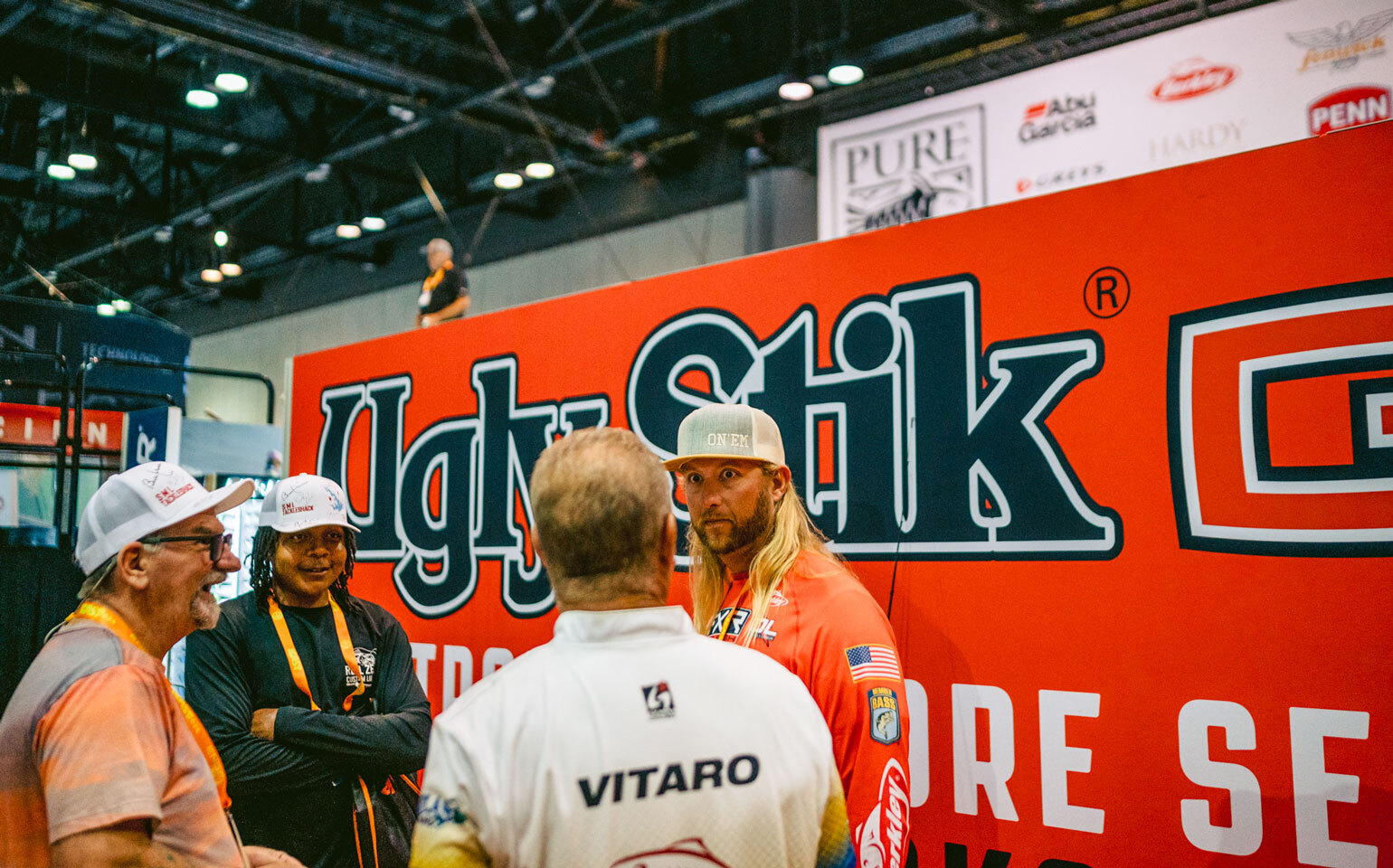 People in Ugly Stik booth at ICAST 2024