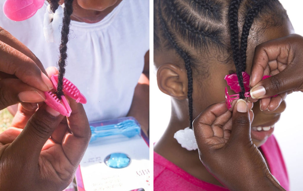 Gabby Bows barrette being clipped on braided hair