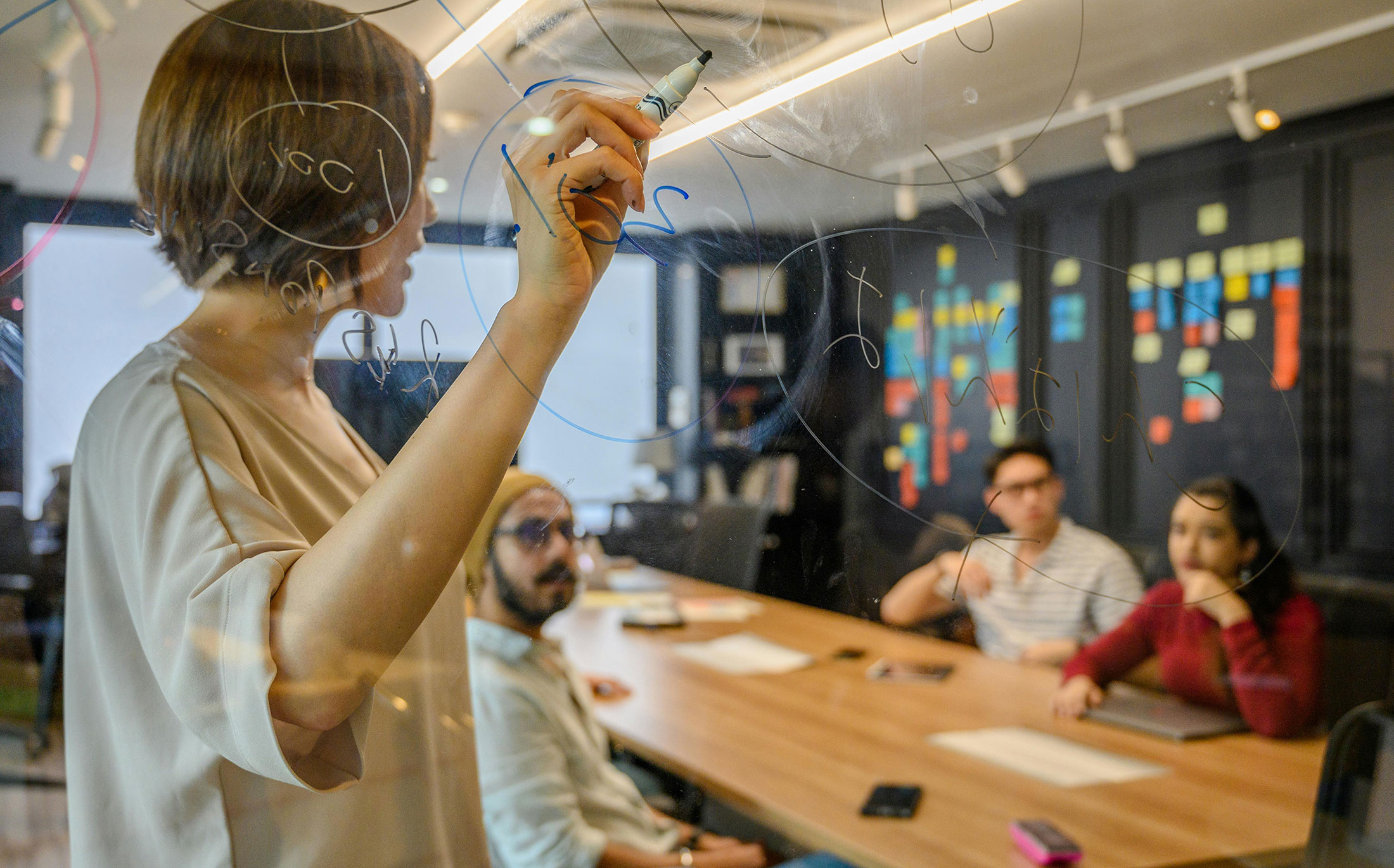 Design team engaging in lifelong learning through collaborative ideation