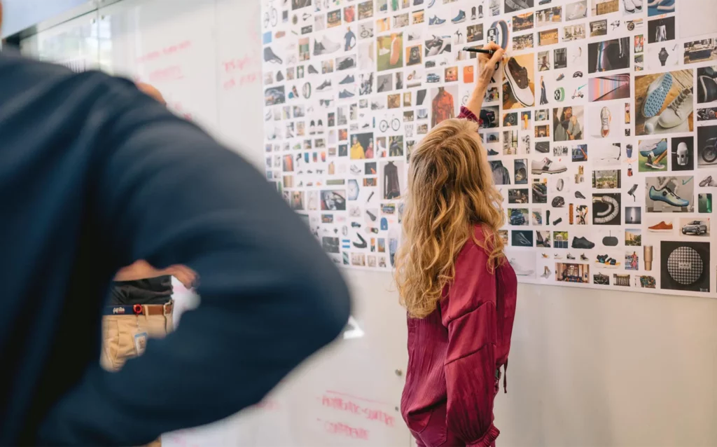 woman brainstorming with a mood board printout