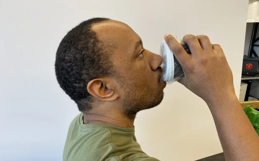 testing a reusable cup and lid prototype