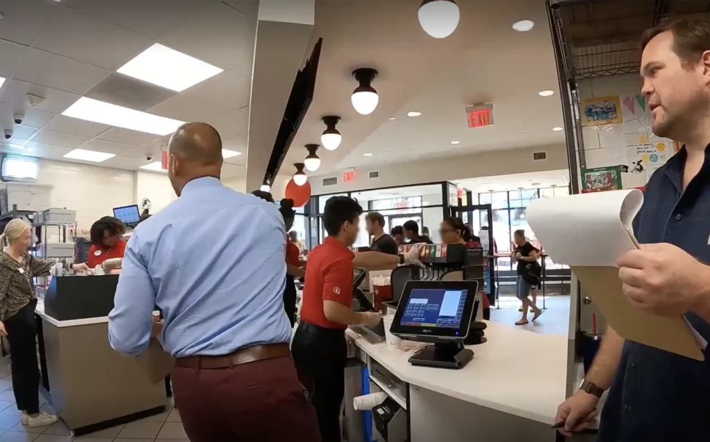 BOLTGROUP employee doing research inside a Chick-fil-A restaurant