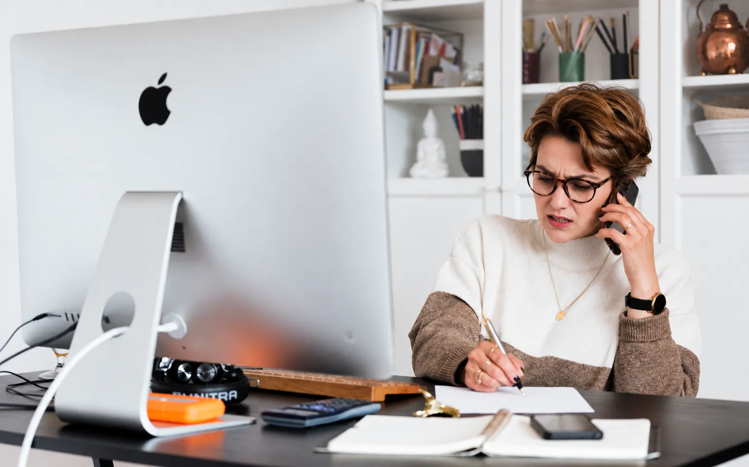 frustrated business woman on phone